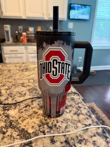 Customer's Thicc Buddy 40oz mug with an Ohio State drip design sitting on a kitchen counter.
