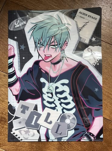 Customer's Alien Stage clear file folder featuring an anime character with mint hair and a skeleton shirt.