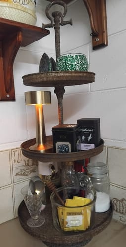 Customer's Timéo three tier stand holding tea, candles, and jars on a kitchen counter.