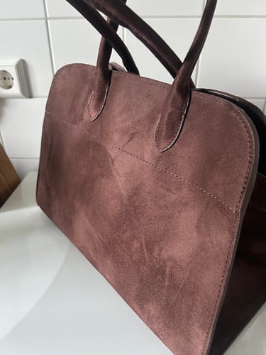 Customer's brown suede Henna Shopper Bag, showing the soft texture and shoulder straps.