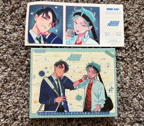 Customer's Alien Stage GAF Collaboration Tickets with colorful anime character illustrations laid out on a carpeted floor.