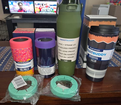 Customer's To-Go Buddy replacement silicone rings in mint green sitting on a table with other drinkware items.