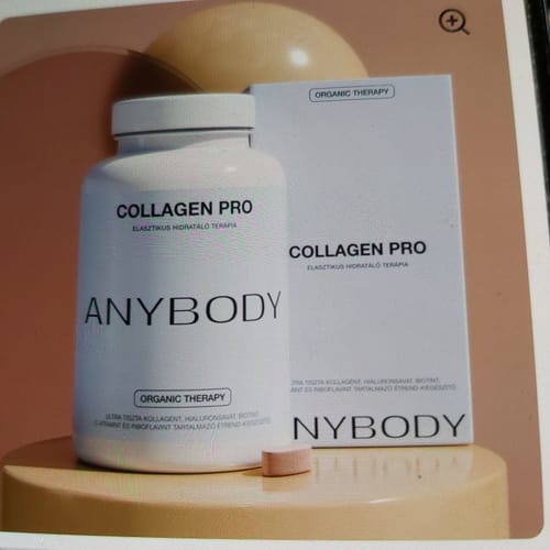 Customer's Collagen Pro supplement bottle and box on a tan surface.