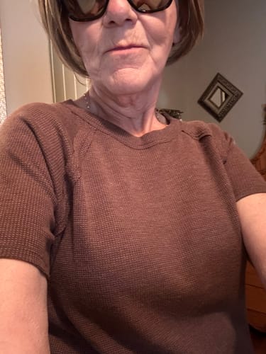 Customer's Zen Everyday Waffle Tee in brown, showing the waffle knit texture and raglan sleeves on the reviewer.