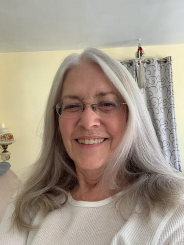 Reviewer's selfie showing the results of using Deep Collagen Cream on their facial skin.