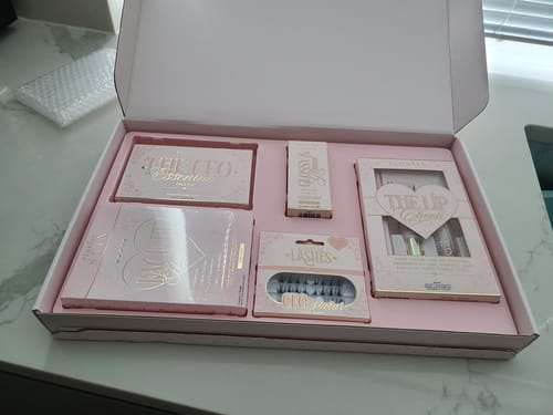 Customer's open P. Louise Budget Box revealing the various cosmetic products neatly packed inside.