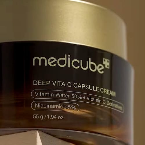 Customer's close-up of the Medicube Deep Vita C Capsule Cream jar, showing the detailed product label.