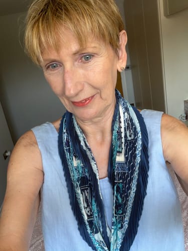 Customer photo review of Hermès Le Jardin des Coptes Silk Plissé Scarf