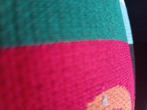 Customer's LFN007 knit top showing a close-up of the colorful, textured fabric pattern.