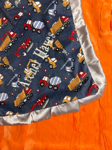 Customer's Personalized Custom Minky blanket with construction truck print and custom embroidered name Archer Hayes