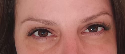 Reviewer's eyes with applied DIY lash extensions after using the LET IT GO Remover