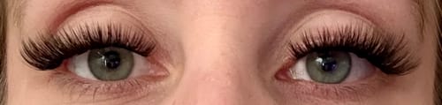 Customer's Starter Set lashes on eyes, creating a full and natural cat-eye look.