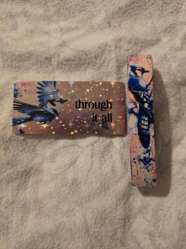 Customer's ZOX Legacy Mystery Club bracelet with a blue jay design, shown with its matching rectangular print.