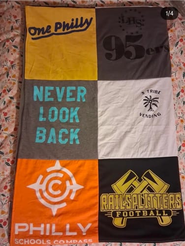 Customer's Project Repat T-Shirt Quilt featuring various colorful school and sports logos.