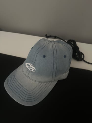 Customer's JR Logo Yıkama Efektli Mavi Cap, showing the blue fabric with visible white logo detail.