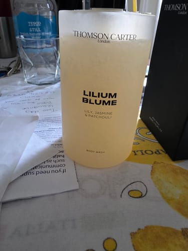 Customer's Thomson Carter Lilium Blume body wash bottle standing on a kitchen surface.