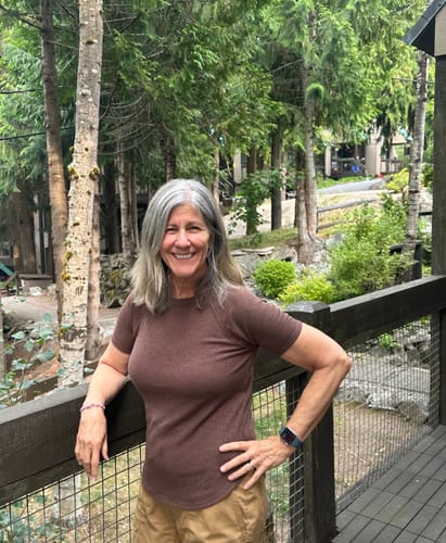 Customer's Zen Everyday Waffle Tee in brown, worn outdoors on a wooden deck.
