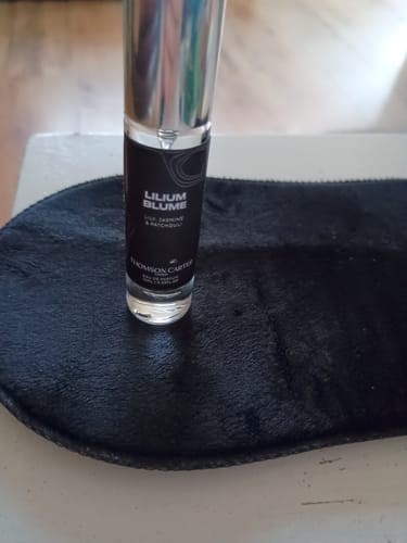 Customer's Lilium Blume eau de parfum bottle standing on a black surface.