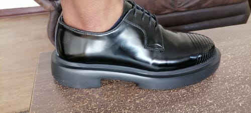 Customer's black 159 Lufiano Lace Up shoe on a foot, showing shiny leather and ribbed toe detail.