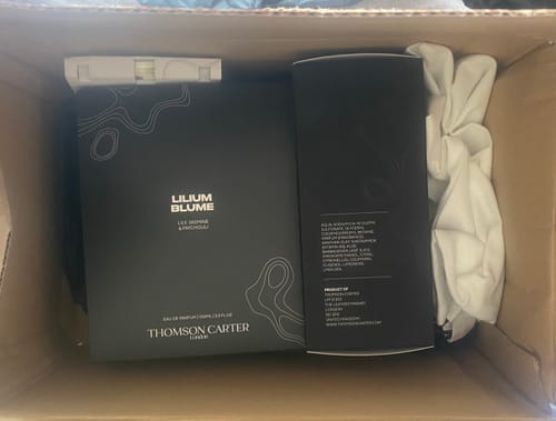 Customer's Lilium Blume Eau de Parfum box and accessories inside a shipping box.