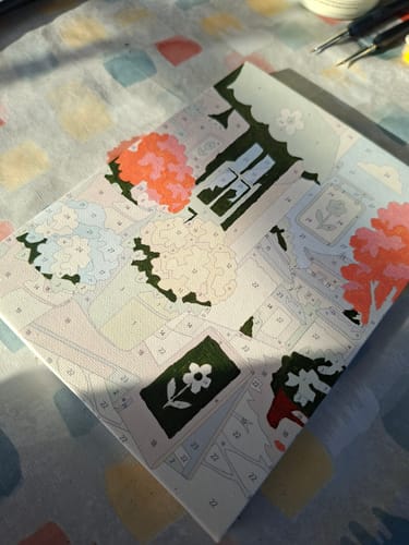 Customer's incomplete Mini-Gemälde Japanische Cafés canvas with numbered sections for painting.