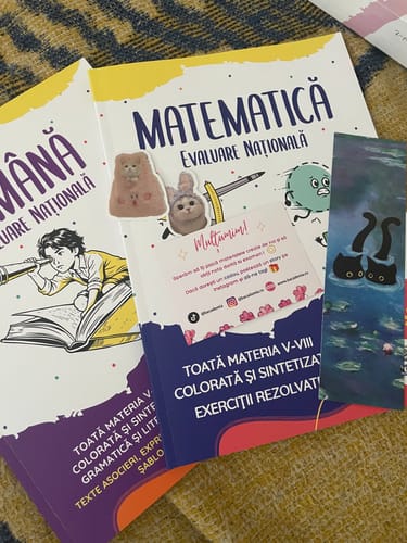 Customer's Pachet Evaluare Națională Bacademia books showing Română and Matematică covers with stickers and a bookmark.