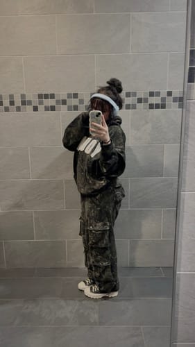 Customer's W251 Hunting Season Cargo Joggers and matching hoodie worn in a bathroom mirror selfie.