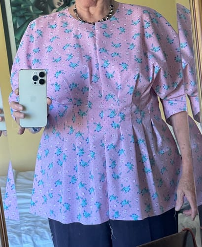 Customer's Country Garden Polycotton Fabric sewn into a floral, pink blouse with three-quarter length sleeves.