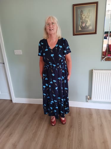 Customer's Falling Flowers Viscose Challis Fabric sewn into a flowy, dark blue floral dress.