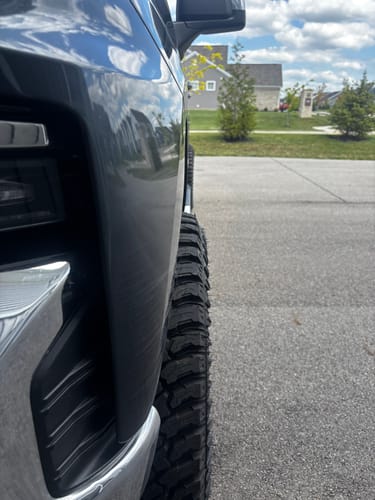 Customer's Chevy Silverado 1500 with installed 2-inch hubcentric wheel spacers, showing an assertive, wider stance.