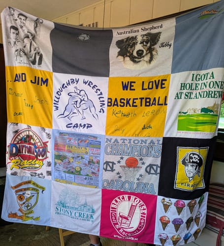 Customer's Project Repat T-Shirt Quilt featuring a colorful collage of various t-shirt graphics.