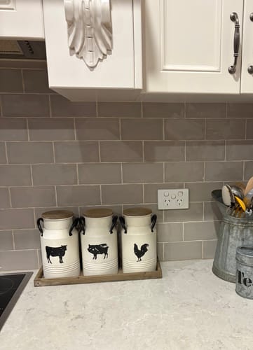 Customer's Petite Ferme Set milk can vases on a wooden tray, styled on a kitchen counter.