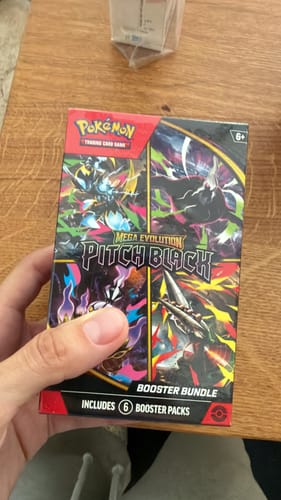 Customer photo review of Pokémon Mega Evolutions Pitch Black Booster Bundle