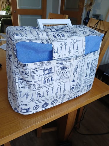 Customer's sewing machine dust cover made with Rose & Hubble cotton poplin fabric, featuring a sewing tool print.