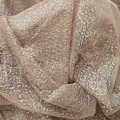 Customer's close-up of folded Soft Net Embroidery Curtain Voile Fabric, showing its sheer, sandy-colored texture.