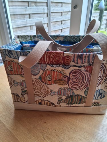 Customer's robust tote bag made from Colourful Fish Tapestry Fabric with sturdy handles.