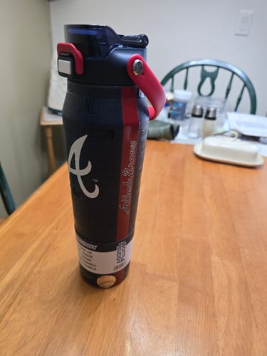 Customer's Atlanta Braves Bottle Buddy 32oz with a black and red design standing on a wooden table.