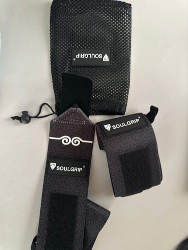 Customer's Dragonforged Nightclaw Wrist Wrap, featuring two black patterned wraps and a matching mesh carry bag.