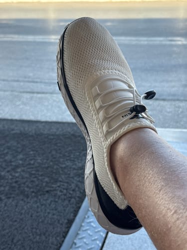 Customer's off-white Aleader Xdrain Crew shoe worn on foot, showing the breathable mesh and quick-dry cord lacing.