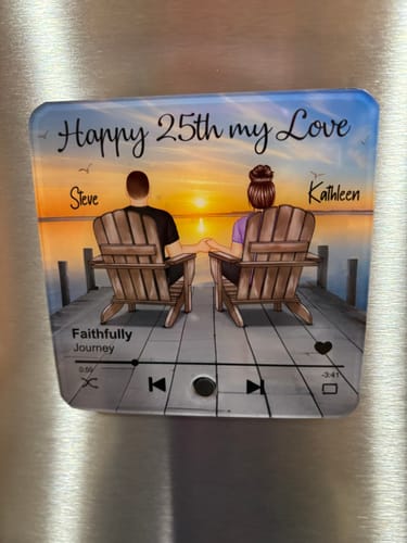 Customer's Personalized Music Fridge Magnet featuring an illustration of a couple at a lake dock on a metal surface.