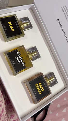 Customer's Make Your Own Tester Pack box containing three square glass perfume bottles labeled Rumi, Black Oud, and Oud Gold.