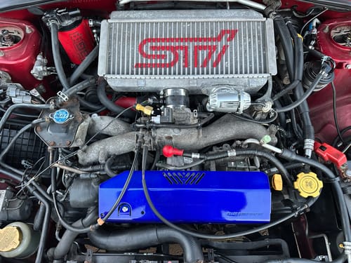 Customer's RIFE Air Temperature Sensor installed in the engine bay of a Subaru Impreza WRX.