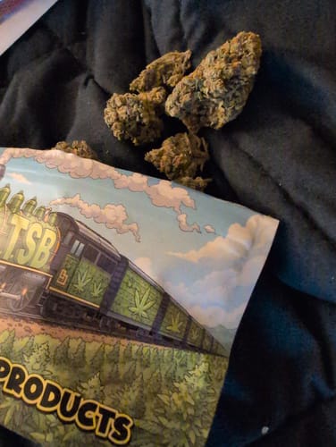 Customer photo review of Sour Tangie THCA Flower