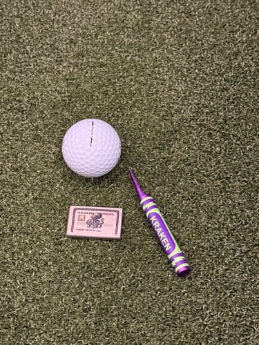 Customer photo review of The Silver Kraken Express Ball Marker | Kraken Titanium Golf Ball Marker