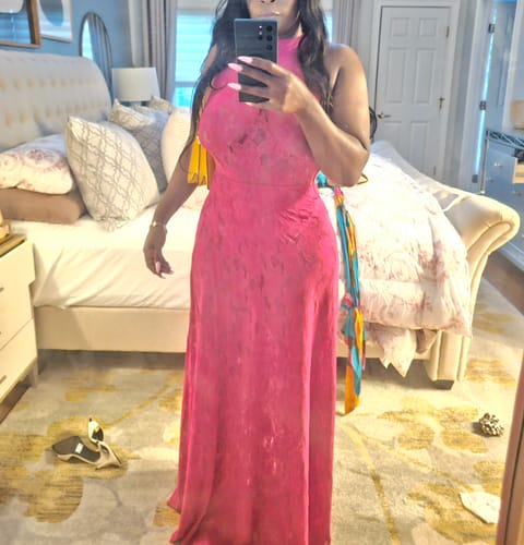 Customer's pink floral lace maxi skirt worn as a dress in a bedroom setting