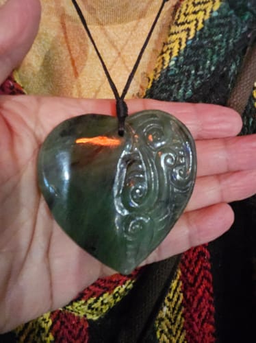 Customer photo review of Genuine NZ Greenstone Heart Necklace with Carved Detail – Pounamu Pendant