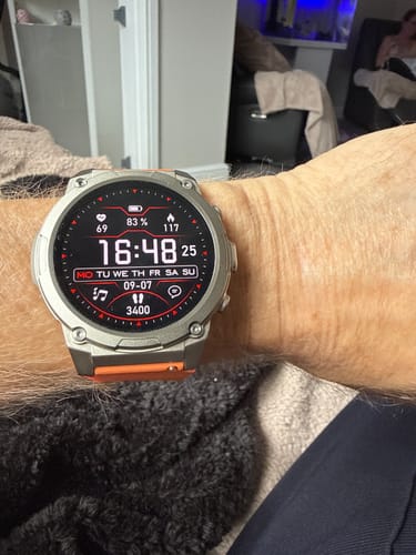 Customer's Gard Pro Ultra 3 smartwatch on wrist, showing digital watch face with 83% battery and health data.