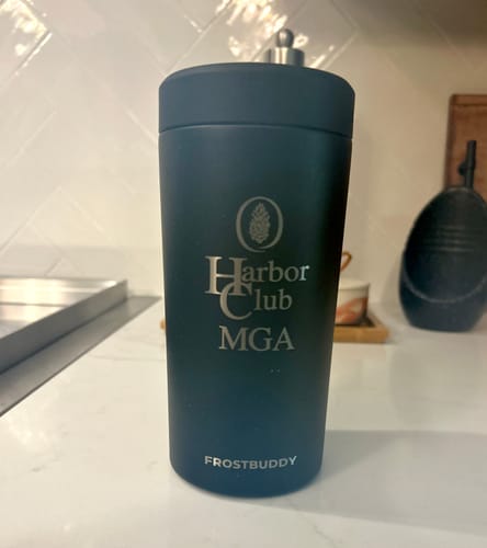 Customer's matte dark XL Universal Buddy engraved with the Harbor Club MGA logo on a kitchen counter.