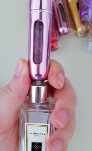 Customer photo review of Portable Mini Jets Perfume Bottle