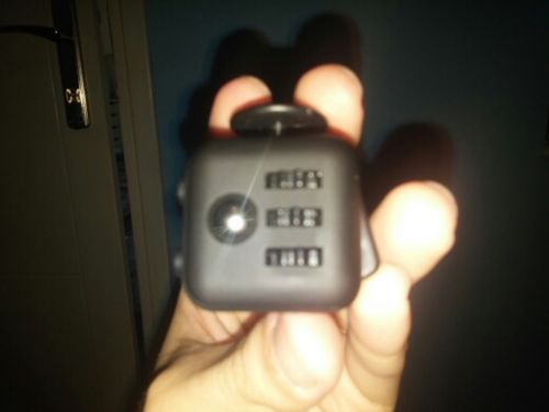 Customer photo review of The Fidget Cube (With Zipper Bag) - 50% Off Today!